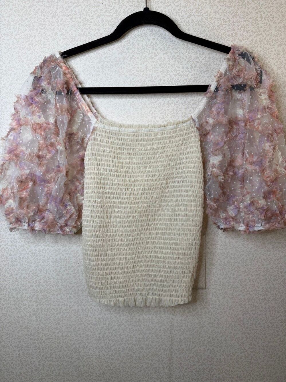 Like new Free People Intimately smocked in the front and she in the back floral